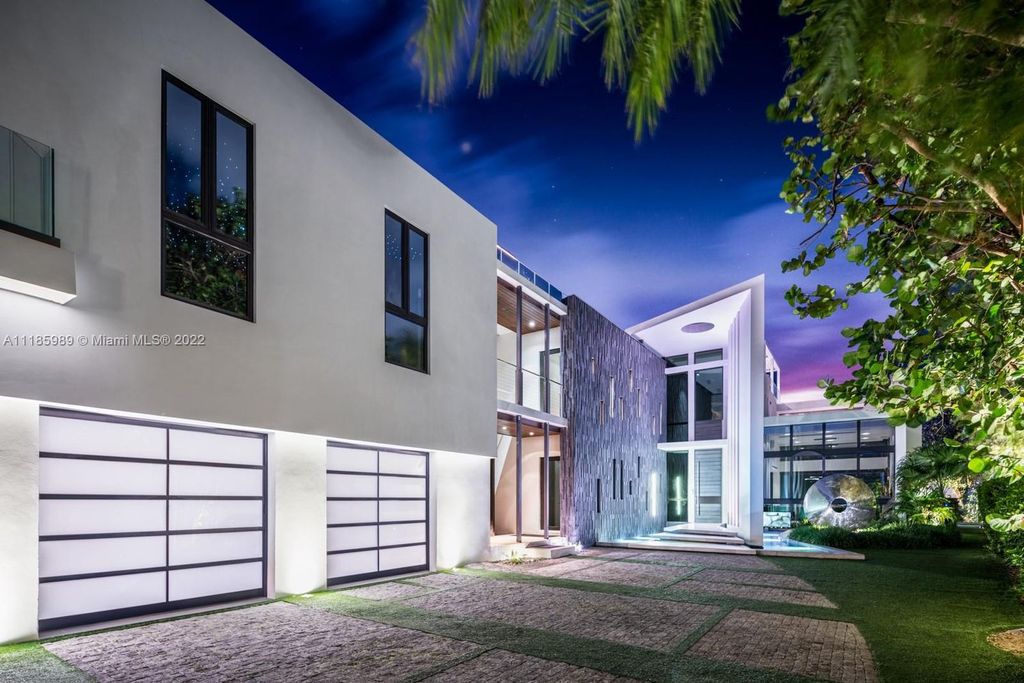 The Home in Miami Beach is a waterfront modern masterpiece on Surprise Point with gorgeous water views throughout now available for sale. This home located at 528 Lakeview Ct, Miami Beach, Florida