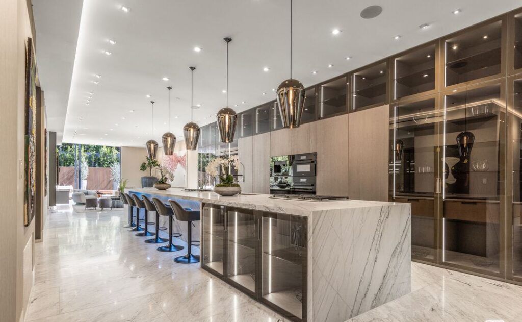 The Home in Los Angeles is an architectural triumph situated in a prestigious lower Bel Air location was built using the finest materials and utmost attention to detail now available for sale. This home located at 120 N Glenroy Ave, Los Angeles, California