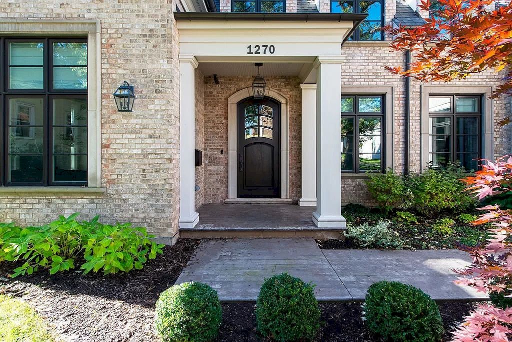 The Home in Illinois is a luxurious home possessing warm brick facade, elegant rooms and flawless finishes now available for sale. This home located at 1270 Church St, Northbrook, Illinois; offering 06 bedrooms and 07 bathrooms with 8,500 square feet of living spaces.