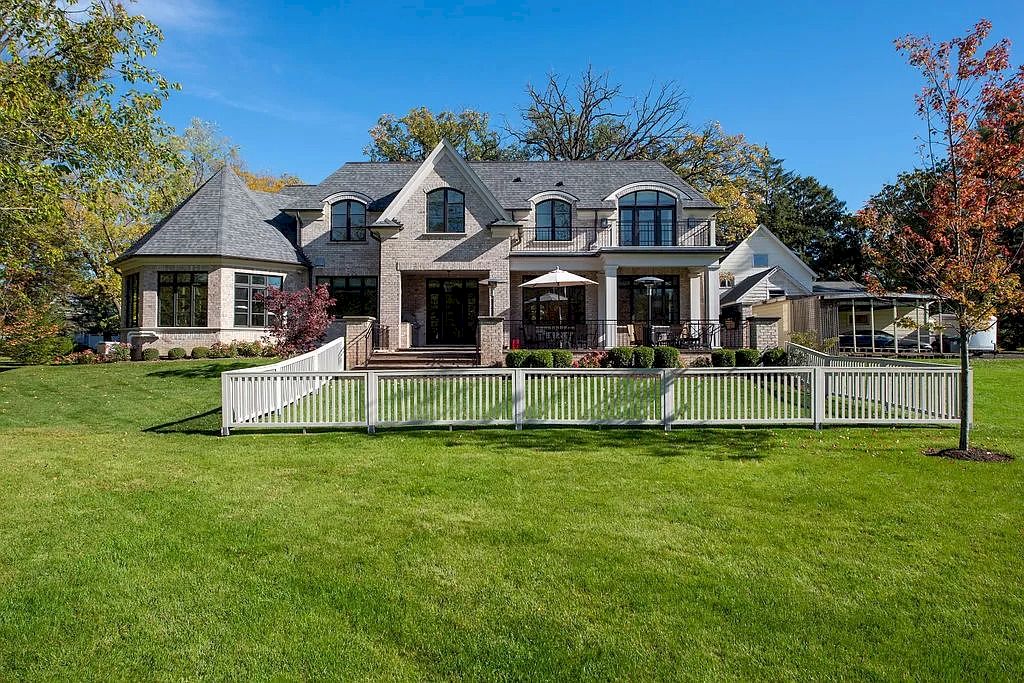 The Home in Illinois is a luxurious home possessing warm brick facade, elegant rooms and flawless finishes now available for sale. This home located at 1270 Church St, Northbrook, Illinois; offering 06 bedrooms and 07 bathrooms with 8,500 square feet of living spaces.