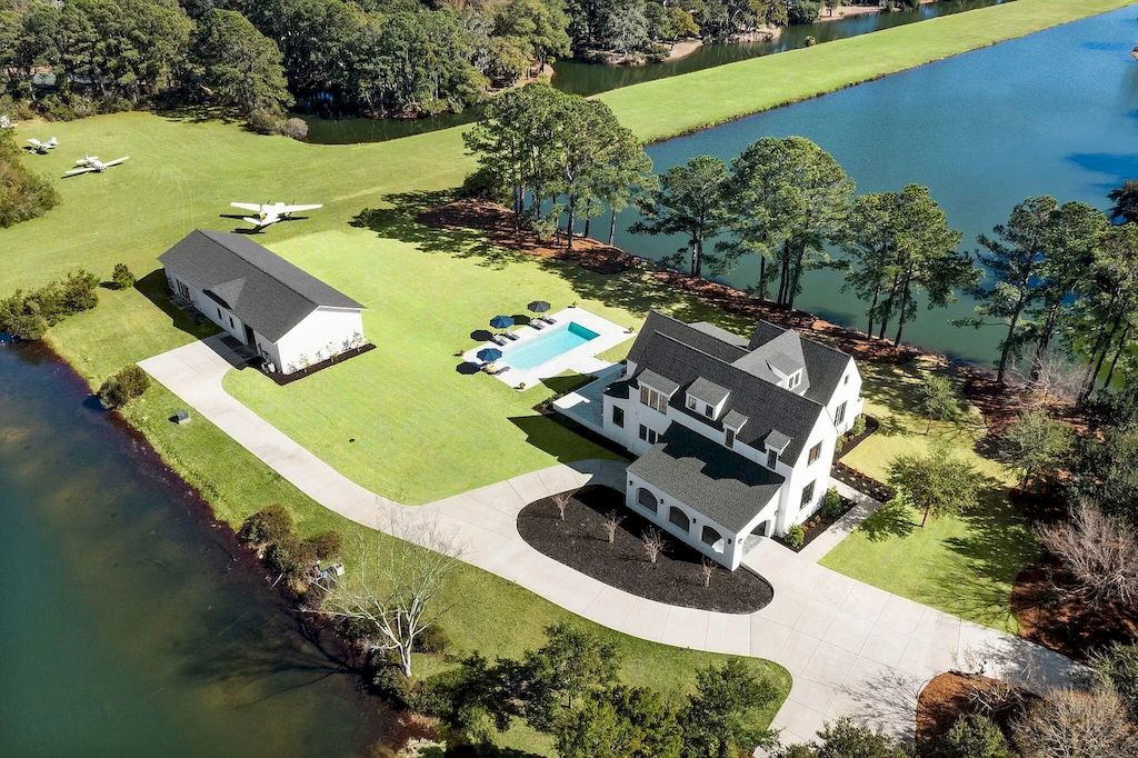 The Home in South Carolina is a luxurious home which includes luxury finishes throughout the home and additional privacy now available for sale. This home located at 1500 Clubhouse Ln, Mount Pleasant, South Carolina; offering 04 bedrooms and 04 bathrooms with 4,312 square feet of living spaces. 