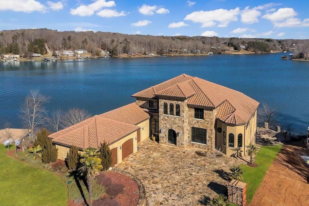 The Estate in Virginia is a luxurious home designed for impressive panoramic lake and mountains views from every corner now available for sale. This home located at 331 Blue Heron Dr, Wirtz, Virginia; offering 05 bedrooms and 05 bathrooms with 7,000 square feet of living spaces.