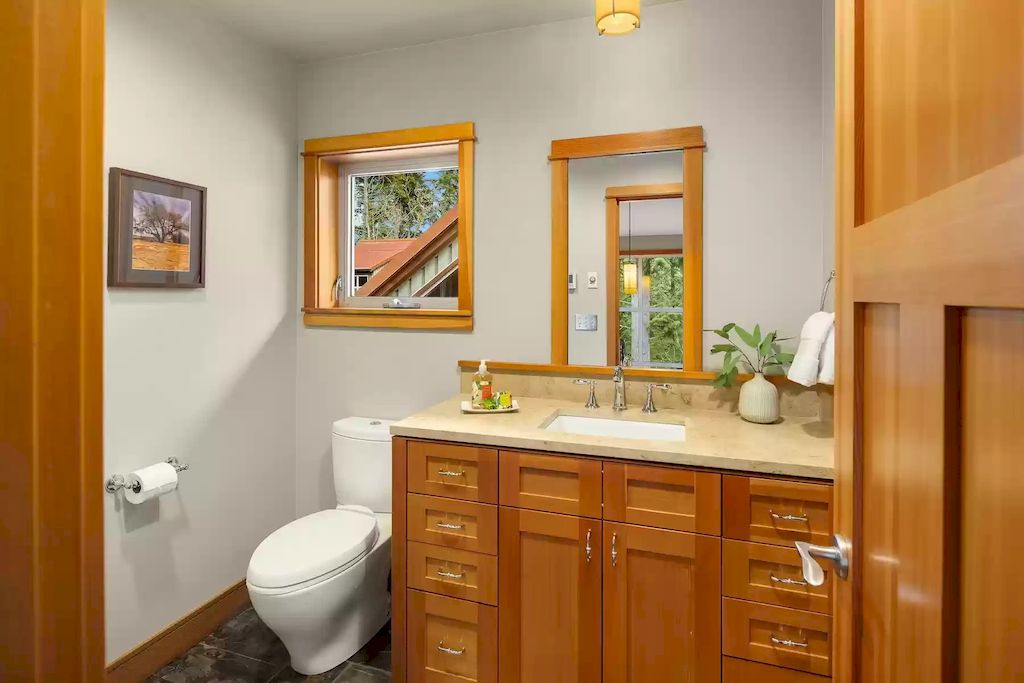 Your bathroom becomes more intimate and warm with simple accents and a rustic approach to architecture and building materials. From the closet to the window frames and mirror frames, wooden frames take up the majority of the space in this design. All have prominent countryside features.