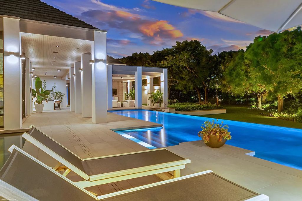 The Mansion in Jupiter is a magnificent home constructed from the finest materials and inspired from amazing resorts around the world now available for sale. This home located at 126 Bears Club Dr, Jupiter, Florida