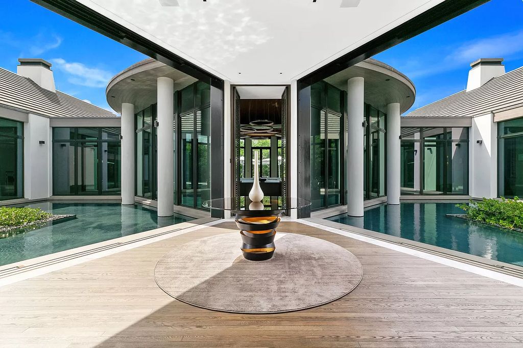 The Mansion in Jupiter is a magnificent home constructed from the finest materials and inspired from amazing resorts around the world now available for sale. This home located at 126 Bears Club Dr, Jupiter, Florida