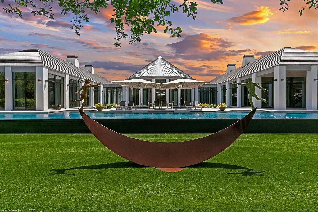 The Mansion in Jupiter is a magnificent home constructed from the finest materials and inspired from amazing resorts around the world now available for sale. This home located at 126 Bears Club Dr, Jupiter, Florida