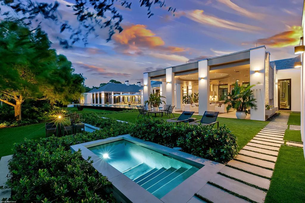 The Mansion in Jupiter is a magnificent home constructed from the finest materials and inspired from amazing resorts around the world now available for sale. This home located at 126 Bears Club Dr, Jupiter, Florida