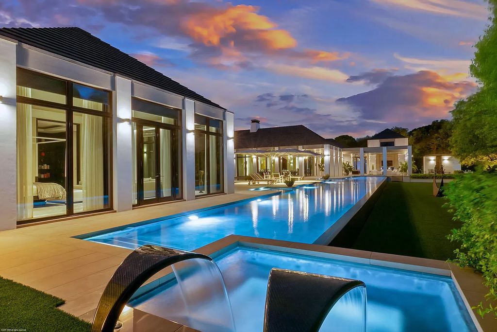 The Mansion in Jupiter is a magnificent home constructed from the finest materials and inspired from amazing resorts around the world now available for sale. This home located at 126 Bears Club Dr, Jupiter, Florida