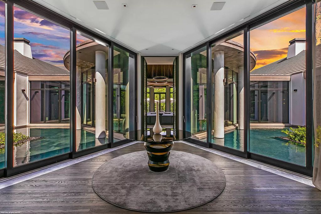 The Mansion in Jupiter is a magnificent home constructed from the finest materials and inspired from amazing resorts around the world now available for sale. This home located at 126 Bears Club Dr, Jupiter, Florida