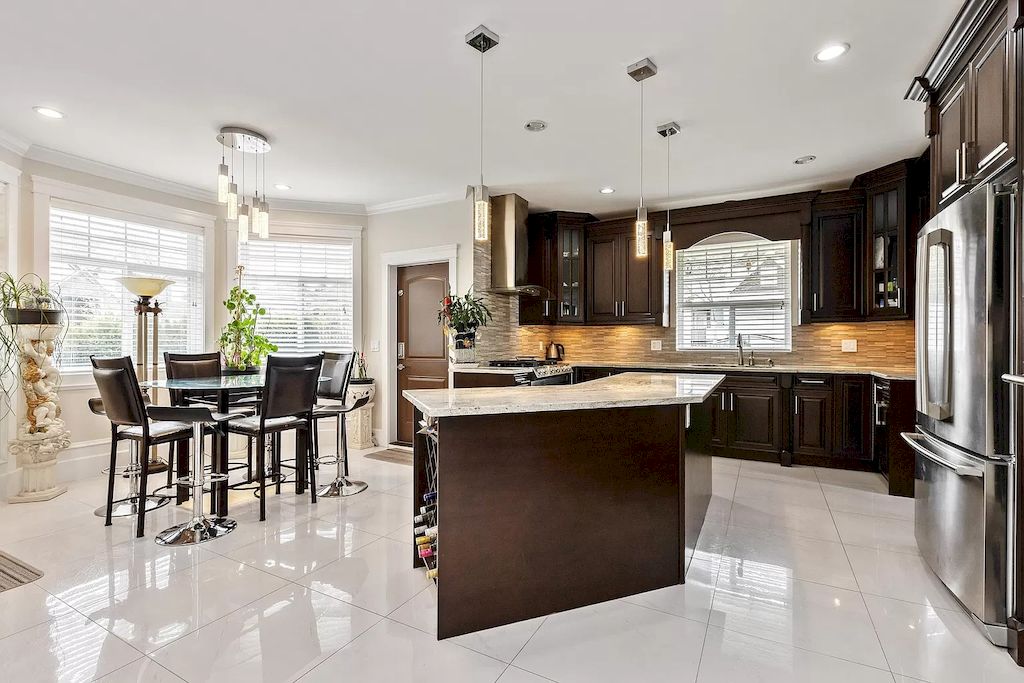The Home in Surrey is a luxurious home with an opulent double height ceiling now available for sale. This home located at 16452 93a Ave, Surrey, BC V4N 5S3, Canada