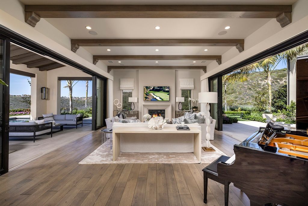 The Home in Newport Beach is majestically perched atop one of Crystal Coves most secluded parcels offerings of open living spaces now available for sale. This home located at 1 S Sur, Newport Coast, California