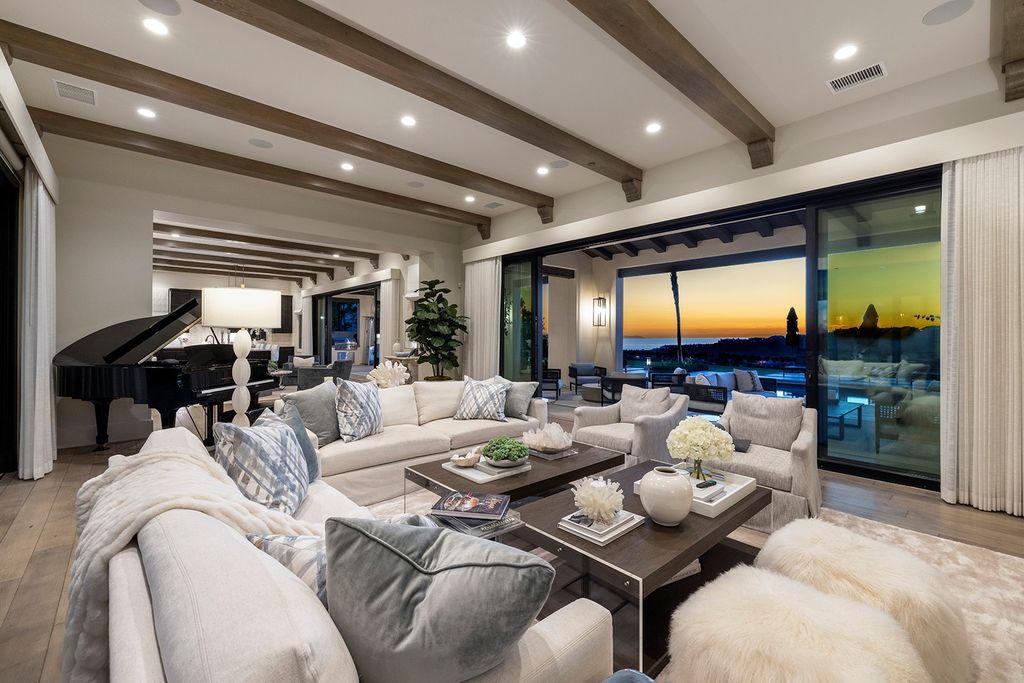 The Home in Newport Beach is majestically perched atop one of Crystal Coves most secluded parcels offerings of open living spaces now available for sale. This home located at 1 S Sur, Newport Coast, California