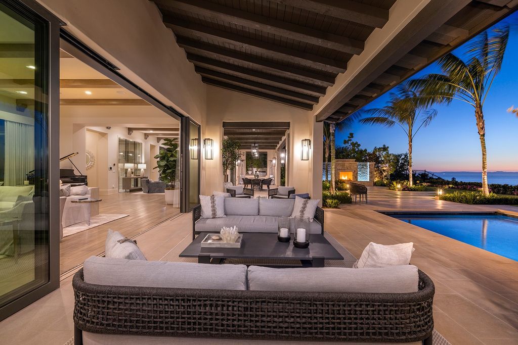 The Home in Newport Beach is majestically perched atop one of Crystal Coves most secluded parcels offerings of open living spaces now available for sale. This home located at 1 S Sur, Newport Coast, California