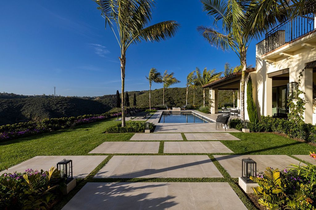 The Home in Newport Beach is majestically perched atop one of Crystal Coves most secluded parcels offerings of open living spaces now available for sale. This home located at 1 S Sur, Newport Coast, California