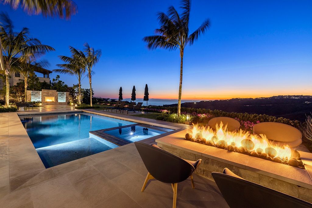 The Home in Newport Beach is majestically perched atop one of Crystal Coves most secluded parcels offerings of open living spaces now available for sale. This home located at 1 S Sur, Newport Coast, California