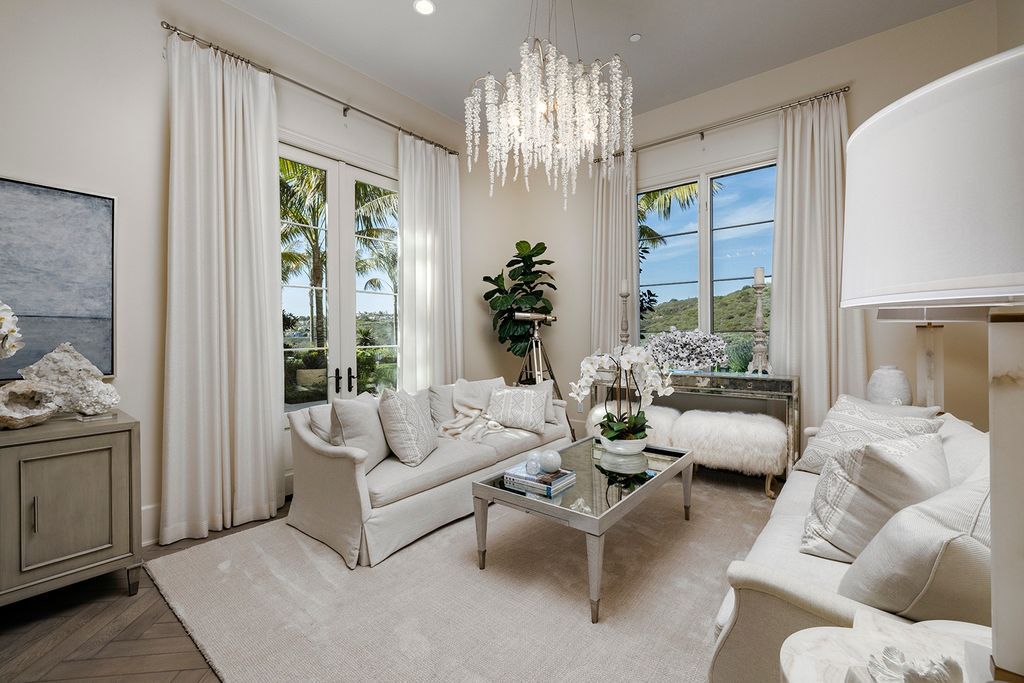 The Home in Newport Beach is majestically perched atop one of Crystal Coves most secluded parcels offerings of open living spaces now available for sale. This home located at 1 S Sur, Newport Coast, California