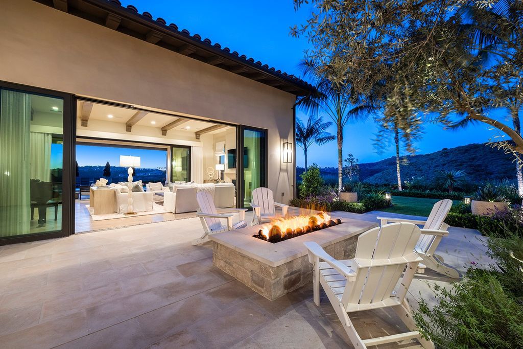 The Home in Newport Beach is majestically perched atop one of Crystal Coves most secluded parcels offerings of open living spaces now available for sale. This home located at 1 S Sur, Newport Coast, California