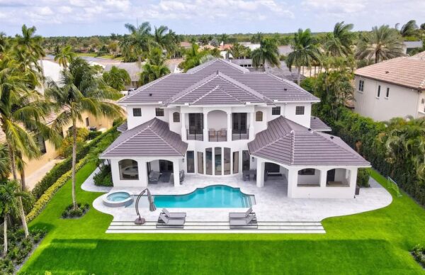 $5,950,000 Transitional Contemporary Home in Boca Raton with Exceptional Water and Expansive Golf Course Vistas