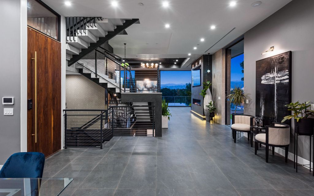 The Home in Los Angeles is an architectural jewel designed by Alon Zakoot overlooking the mountain vistas and spectacular city views now available for sale. This home located at 3712 Broadlawn Dr, Los Angeles, California