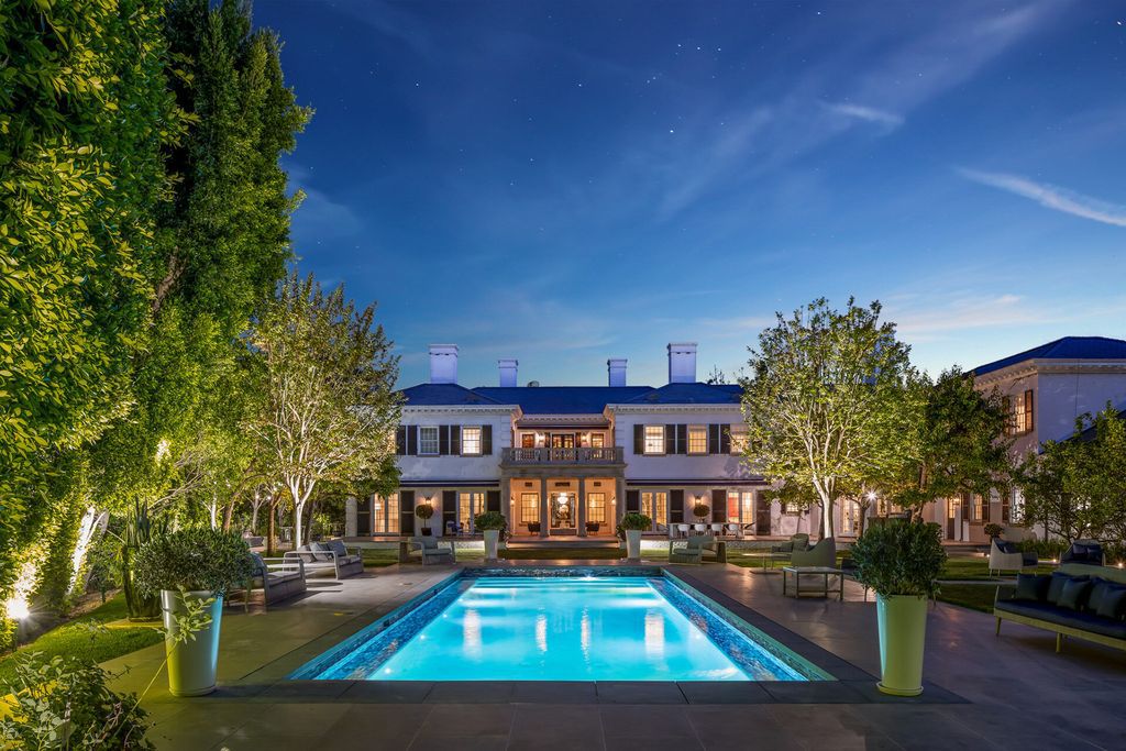 The Mansion in Bel Air is a stunning traditional estate recently remodeled with a sweeping staircase, a large living room and a very large swimming pool now available for sale. This home located at 385 Copa De Oro Rd, Los Angeles, California