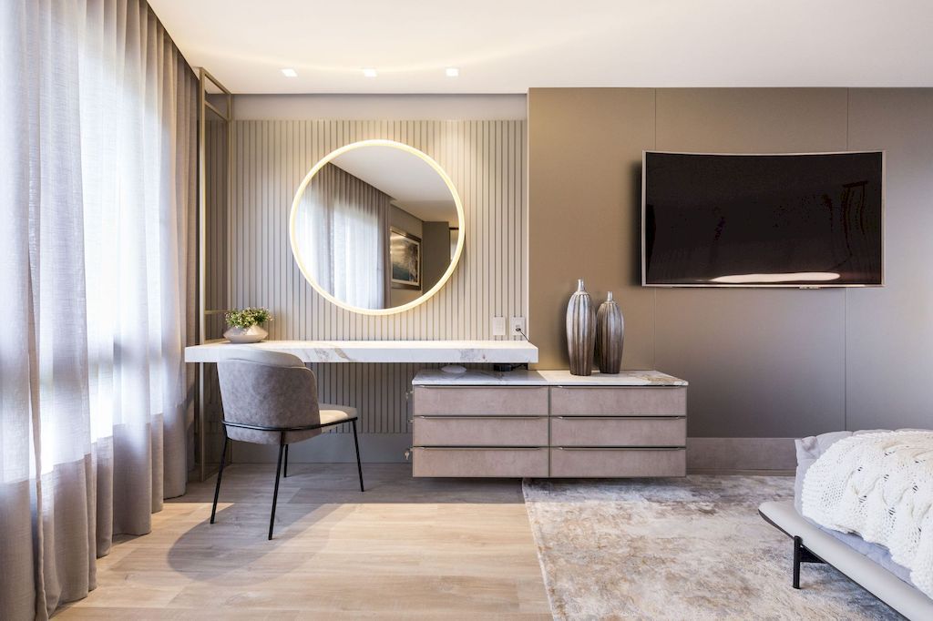 Drawers with touch-latch doors are always welcome in modern bedrooms. This is where you'll find a lot of physical and visual storage. The modern cabinet next to the dressing table has added strength and serves as a makeup storage shelf.