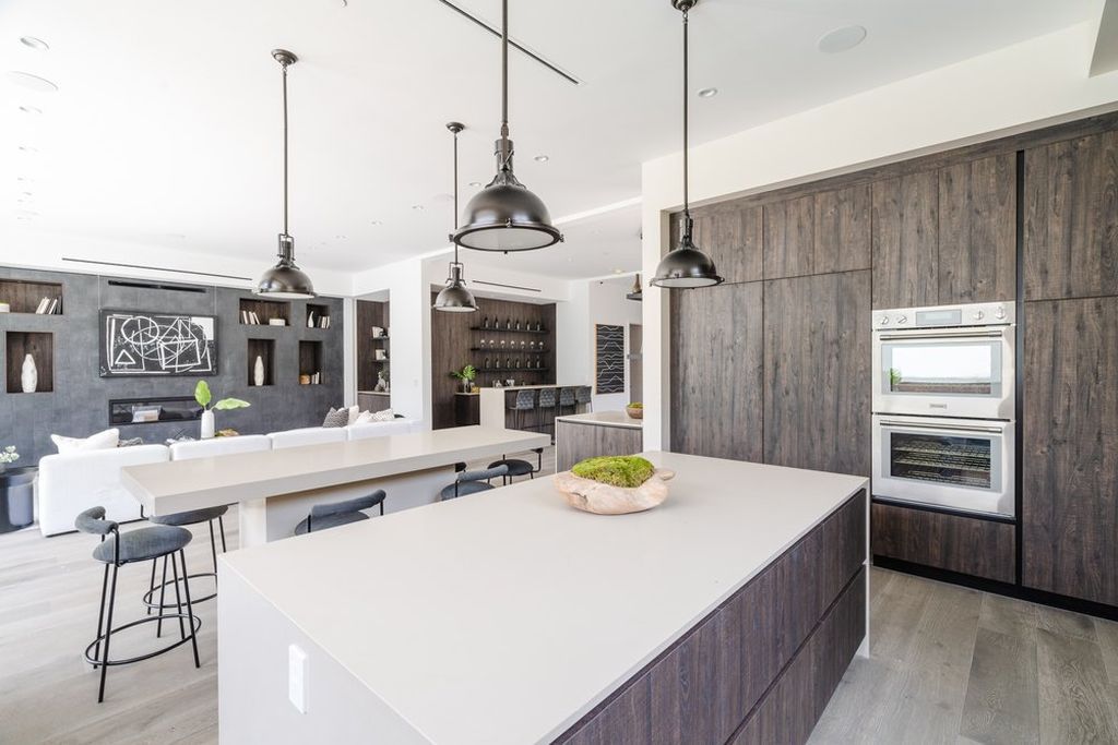 The Home in Venice is a brand new construction estate was exceptionally designed with every detail in mind with stunning finishes and custom fixtures throughout now available for sale. This home located at 2001 Glencoe Ave, Venice, California