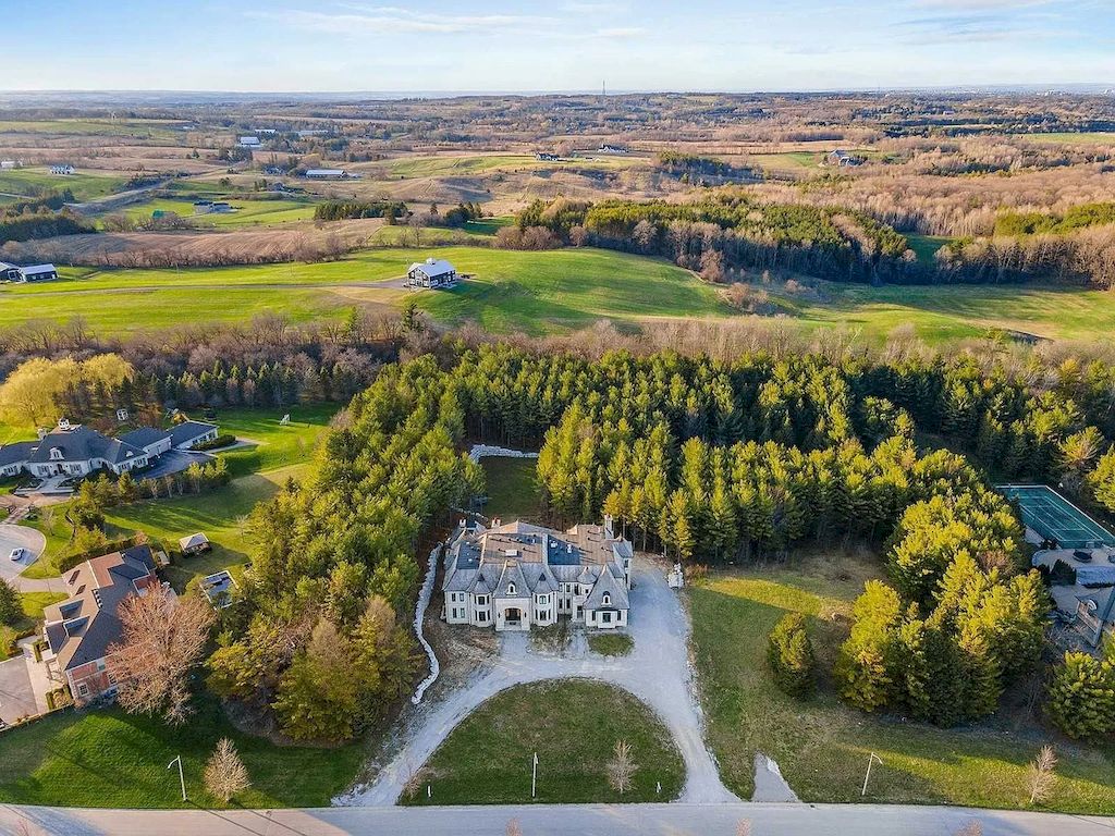 The Mansion in Ontario is an masterpiece provides the privacy and serenity you've been looking for, now available for sale. This home located at 16 Scotch Valley Dr, King, ON L7B 1L9, Canada