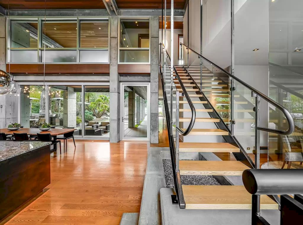 The Estate in Washington is a luxurious home with glass walls to bring nature inside now available for sale. This home located at 7917 219th Avenue NE, Redmond, Washington; offering 03 bedrooms and 07 bathrooms with 4,690 square feet of living spaces.