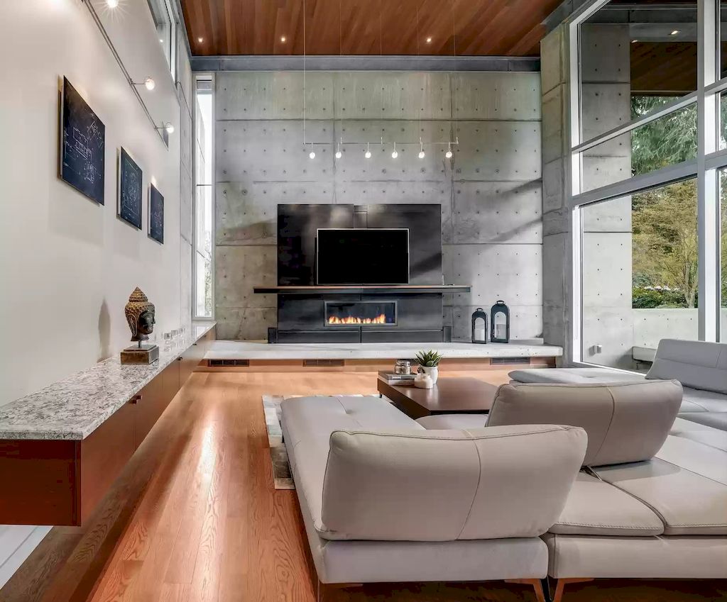 The Estate in Washington is a luxurious home with glass walls to bring nature inside now available for sale. This home located at 7917 219th Avenue NE, Redmond, Washington; offering 03 bedrooms and 07 bathrooms with 4,690 square feet of living spaces.