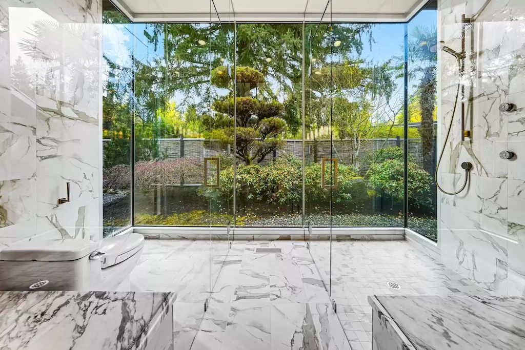 The Estate in Washington is a luxurious home with glass walls to bring nature inside now available for sale. This home located at 7917 219th Avenue NE, Redmond, Washington; offering 03 bedrooms and 07 bathrooms with 4,690 square feet of living spaces.