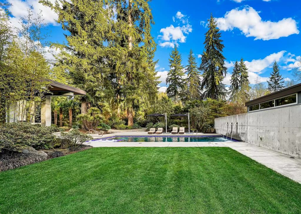 The Estate in Washington is a luxurious home with glass walls to bring nature inside now available for sale. This home located at 7917 219th Avenue NE, Redmond, Washington; offering 03 bedrooms and 07 bathrooms with 4,690 square feet of living spaces.