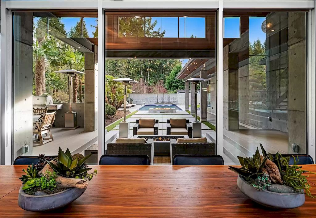 The Estate in Washington is a luxurious home with glass walls to bring nature inside now available for sale. This home located at 7917 219th Avenue NE, Redmond, Washington; offering 03 bedrooms and 07 bathrooms with 4,690 square feet of living spaces.