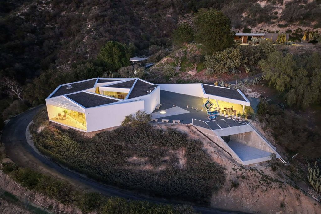 The Home in La Crescenta is an exceptional architectural compound occupies an extraordinary 5.7 acre curated succulent garden now available for sale. This home located at 3947 Markridge Rd, La Crescenta, California