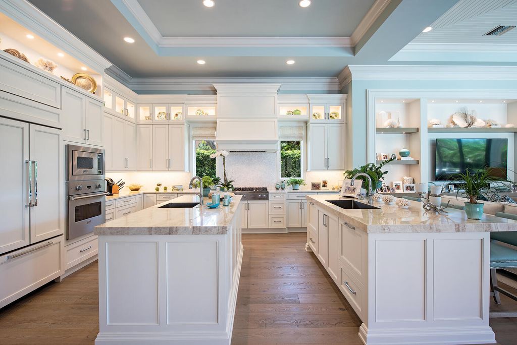 Enhance the functionality and organization of your kitchen by installing upper storage. By adding cabinets or shelves above your countertops, you can maximize your kitchen space and create additional storage options. In the above idea, the topmost level of the upper cabinets is utilized to showcase the owner's favorite dishware, creating a new focal point in the kitchen space that exceeds the perfection.