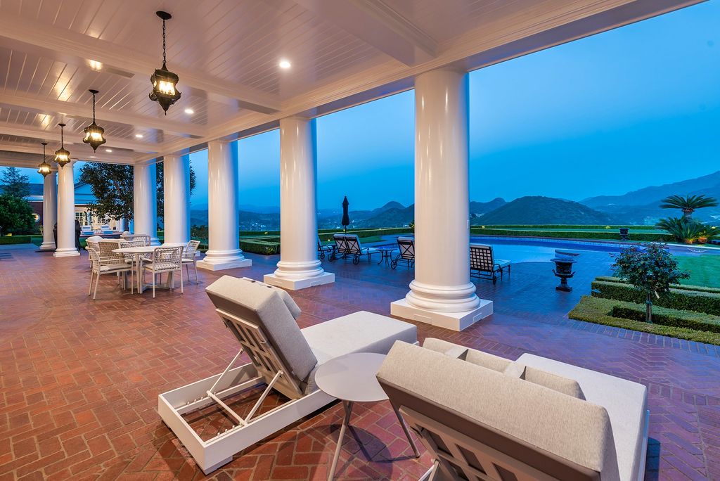 The Estate in Thousand Oaks is a world class colonial revival atop an astounding 6.5 acre promontory boasting explosive 360 degree views of the lake now available for sale. This home located at 1072 Newbern Ct, Thousand Oaks, California;