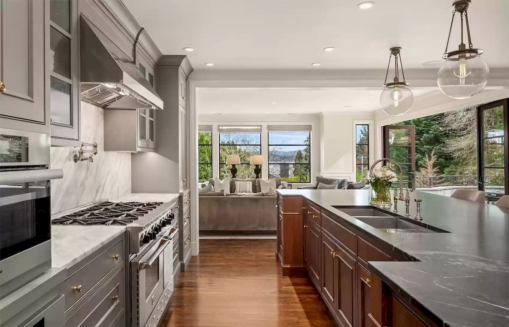 The Estate in Washington is a luxurious home with state of the art appliances and located on a very private setting and now available for sale. This home located at 6523 NE Windermere Rd, Seattle, Washington; offering 05 bedrooms and 06 bathrooms with 6,590 square feet of living spaces.