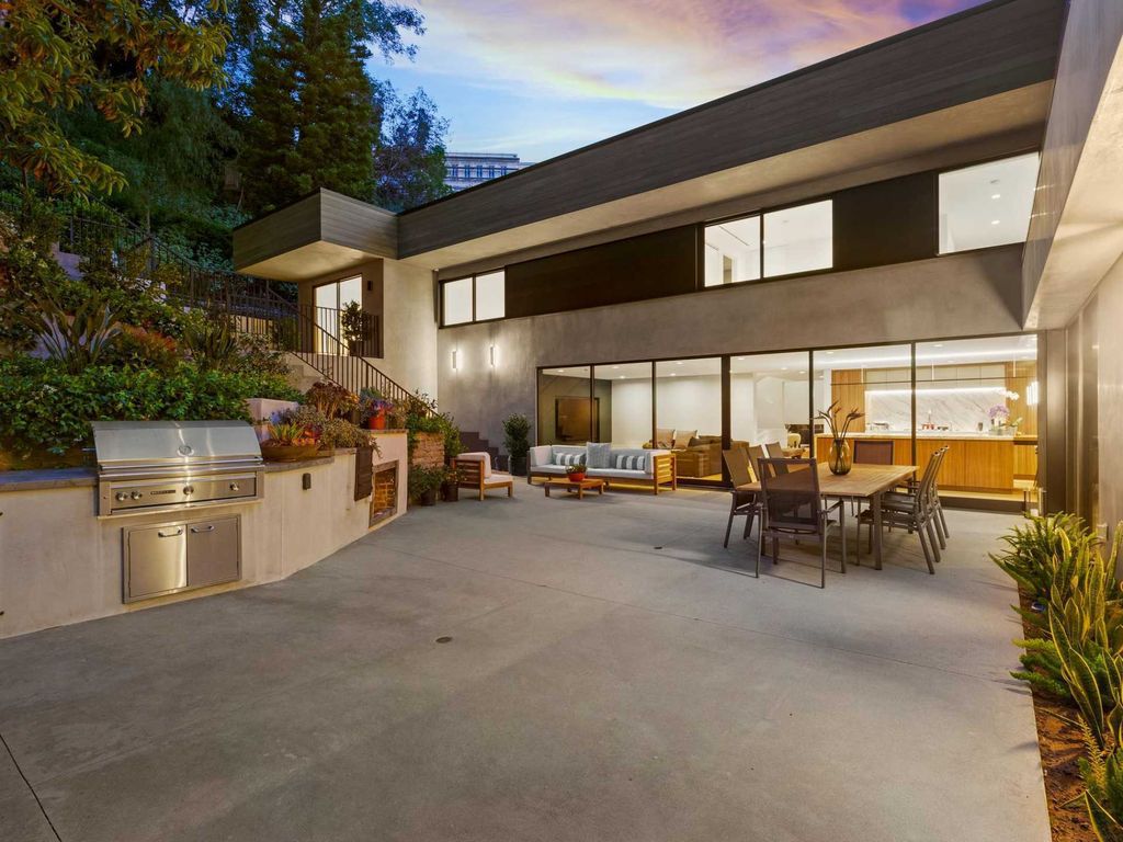 The Home in Bel Air is a meticulously remodeled modern-contemporary estate with beautiful plantings and trees now available for sale. This home located at 10542 Fontenelle Way, Los Angeles, California
