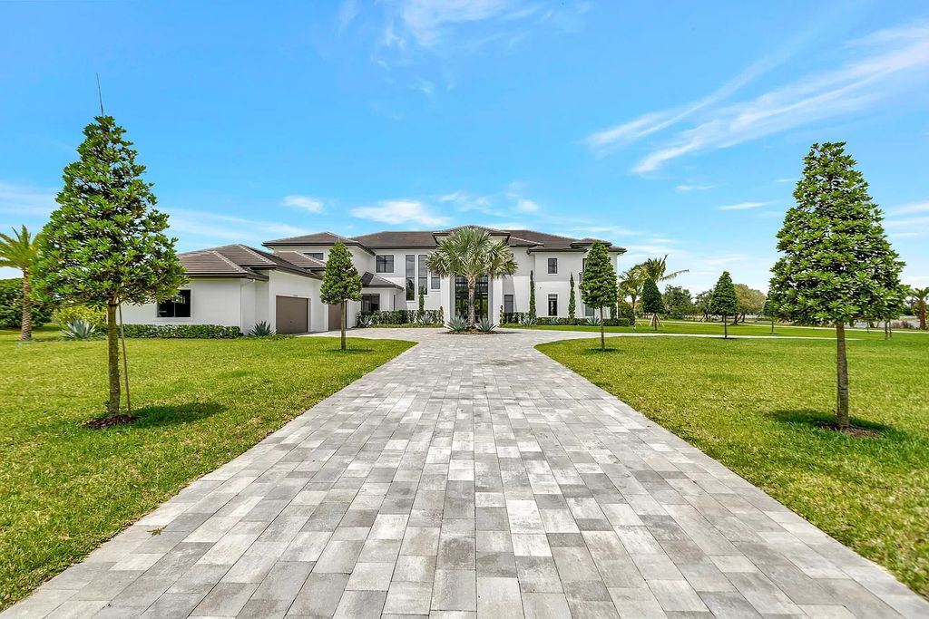The Home in Delray Beach is a New custom furnished luxury estate situated on 2 acres of land with one of the best lake front lots now available for sale. This home located at 10540 El Paraiso Pl, Delray Beach, Florida