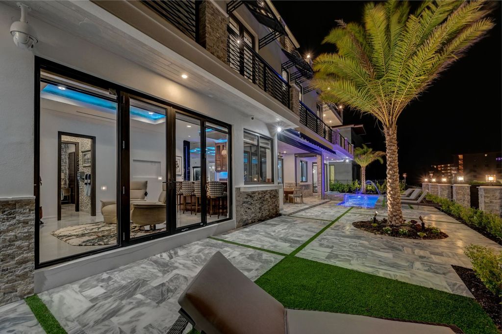 The Home in Boca Raton is a new waterfront home on the edge of the intracoastal with highest level of Furniture and art work now available for sale. This home located at 2900 NE 8th Ave, Boca Raton, Florida