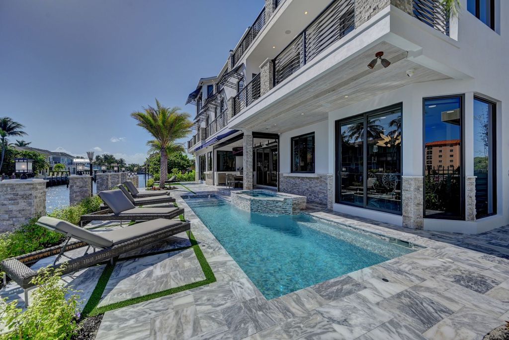 The Home in Boca Raton is a new waterfront home on the edge of the intracoastal with highest level of Furniture and art work now available for sale. This home located at 2900 NE 8th Ave, Boca Raton, Florida