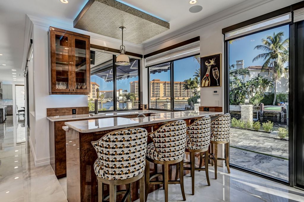 The Home in Boca Raton is a new waterfront home on the edge of the intracoastal with highest level of Furniture and art work now available for sale. This home located at 2900 NE 8th Ave, Boca Raton, Florida