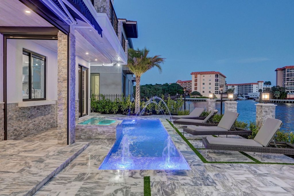 The Home in Boca Raton is a new waterfront home on the edge of the intracoastal with highest level of Furniture and art work now available for sale. This home located at 2900 NE 8th Ave, Boca Raton, Florida