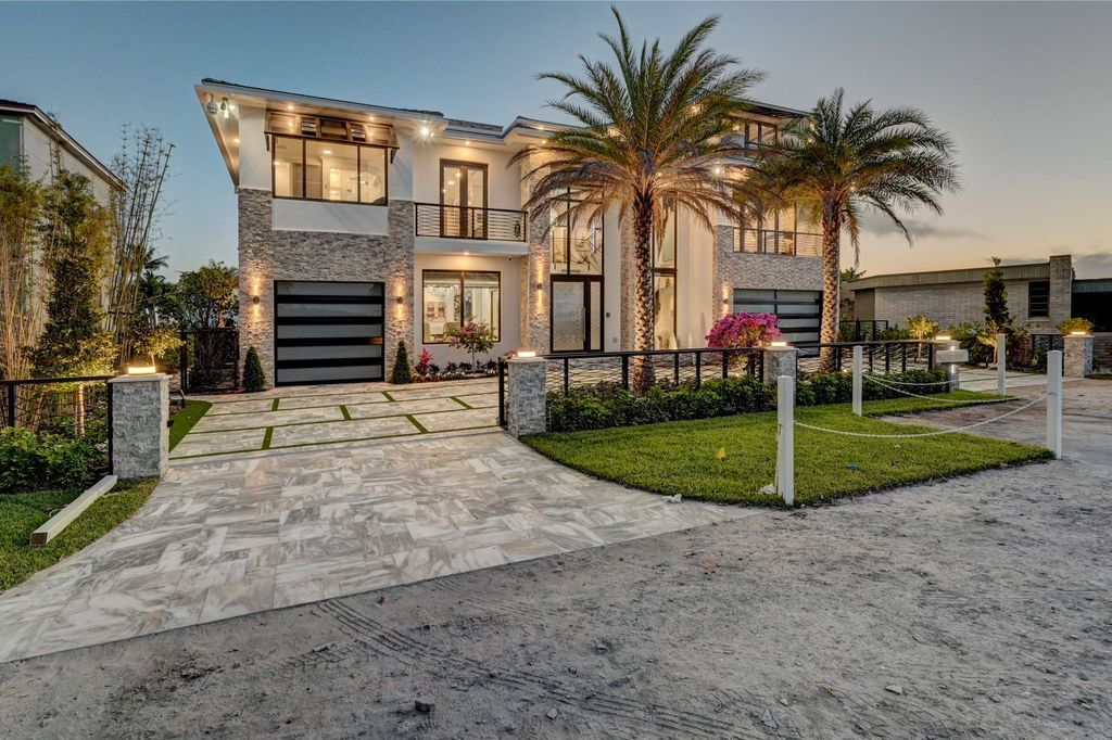 The Home in Boca Raton is a new waterfront home on the edge of the intracoastal with highest level of Furniture and art work now available for sale. This home located at 2900 NE 8th Ave, Boca Raton, Florida