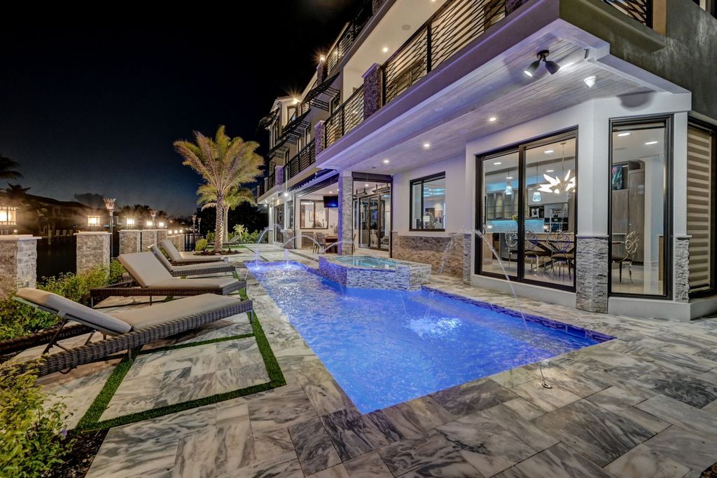 The Home in Boca Raton is a new waterfront home on the edge of the intracoastal with highest level of Furniture and art work now available for sale. This home located at 2900 NE 8th Ave, Boca Raton, Florida