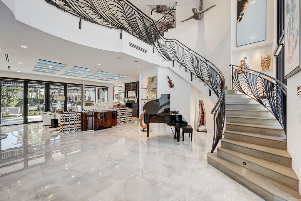 The Home in Boca Raton is a new waterfront home on the edge of the intracoastal with highest level of Furniture and art work now available for sale. This home located at 2900 NE 8th Ave, Boca Raton, Florida