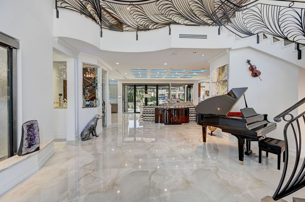 The Home in Boca Raton is a new waterfront home on the edge of the intracoastal with highest level of Furniture and art work now available for sale. This home located at 2900 NE 8th Ave, Boca Raton, Florida