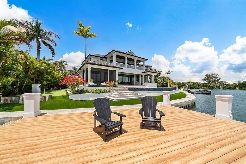 The Home in Holmes Beach is a luxurious, sprawling waterfront front estate tucked away at the end of a quiet cul de sac on desirable Anna Maria Island now available for sale. This home located at 535 70th St, Holmes Beach, Florida