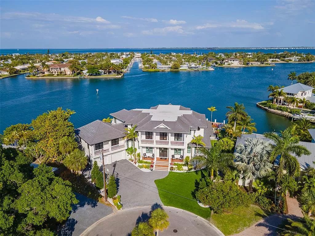 The Home in Holmes Beach is a luxurious, sprawling waterfront front estate tucked away at the end of a quiet cul de sac on desirable Anna Maria Island now available for sale. This home located at 535 70th St, Holmes Beach, Florida