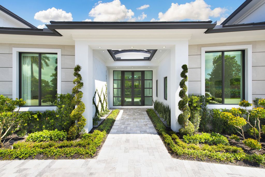 The Home in Boca Raton is a newly renovated Estate in the prestigious Royal Palm Yacht and Country Club with resort-style amenities now available for sale. This home located at 231 Thatch Palm Dr, Boca Raton, Florida