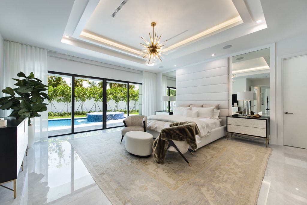 The Home in Boca Raton is a newly renovated Estate in the prestigious Royal Palm Yacht and Country Club with resort-style amenities now available for sale. This home located at 231 Thatch Palm Dr, Boca Raton, Florida